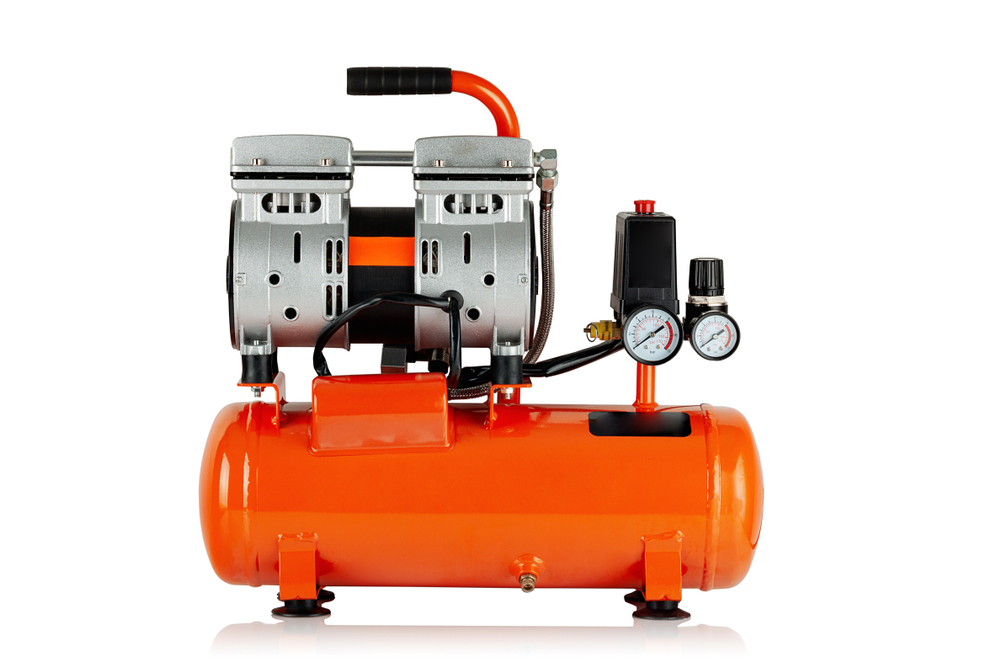 New,,orange,air,compressor,on,white,background